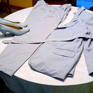 Pant suit with matching shoes and belt